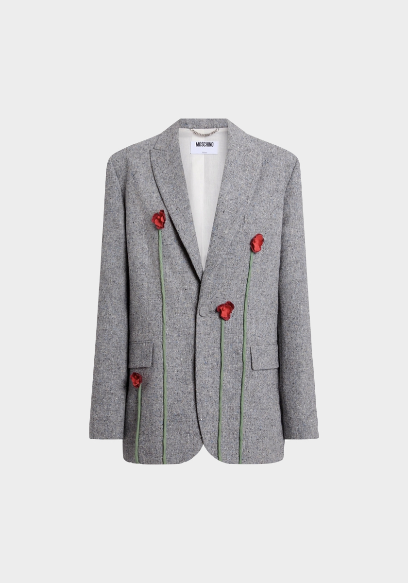 Blazer em tweed, € 1.780, Moschino.