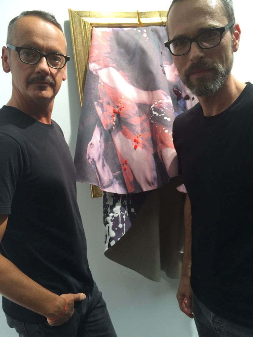 Viktor Horsting and Rolf Snoeren hanging their 'Wearable Art' frame collection, 2015