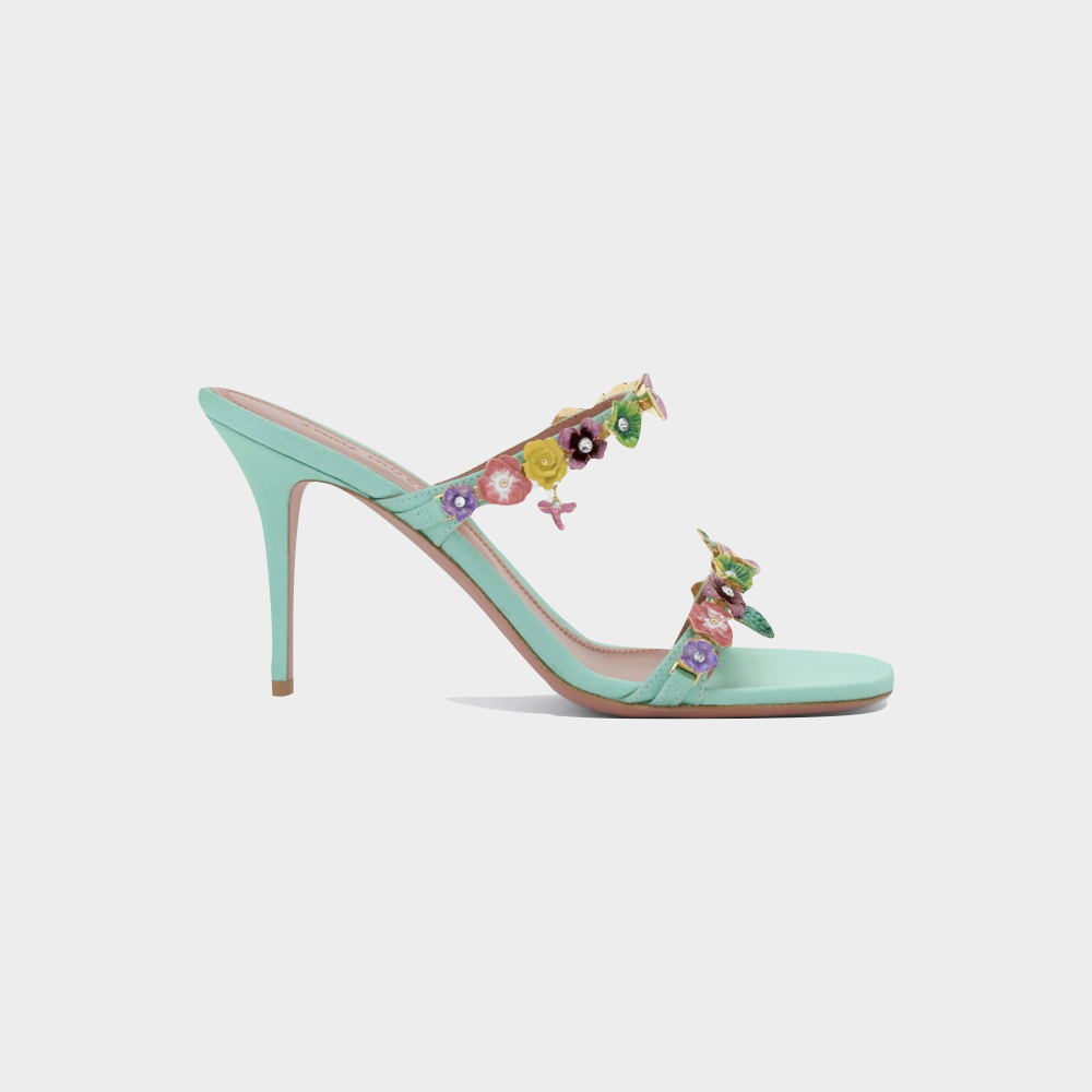 Mules Vittoria, € 1.290, Amina Muaddi.