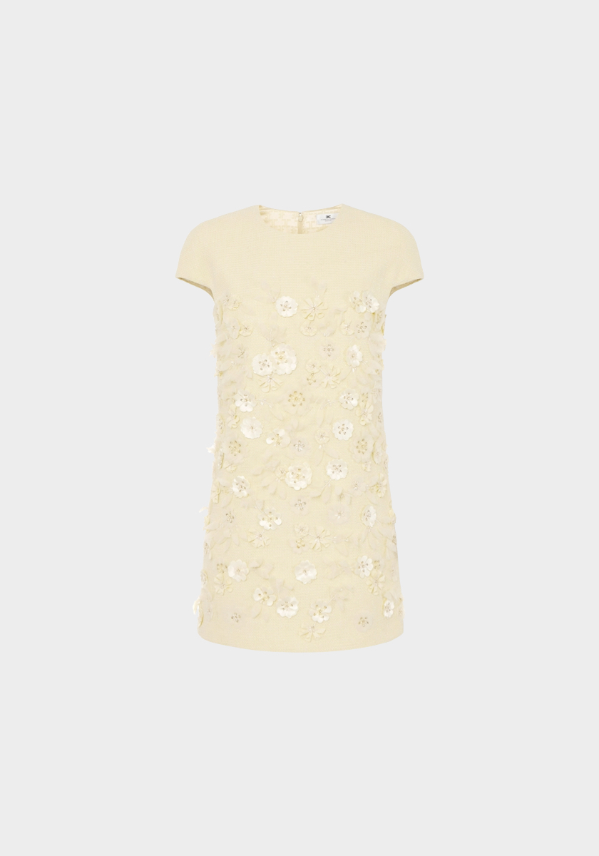 Vestido em tweed, € 810, Elisabetta Franchi.