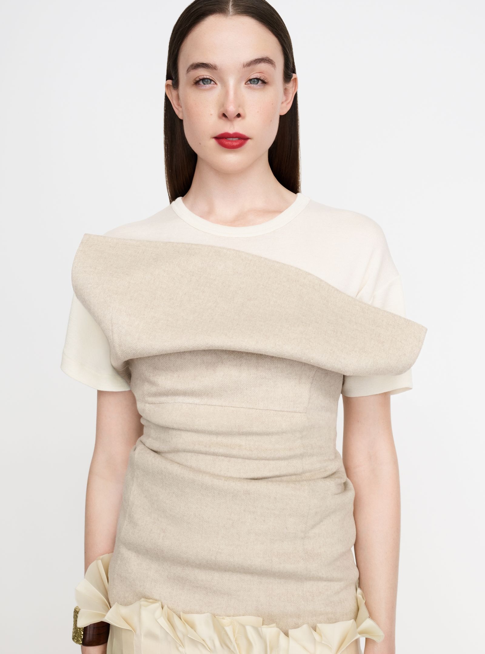 Top e bustier Khaite. Pulseira Ana Khouri.