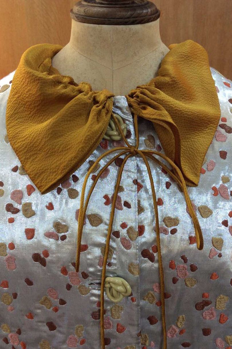 Rose buttons and a discreet, abstracted floral fabric